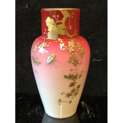 122 - A Bohemian peach blow overlay glass baluster vase, graduated deep pink over white, gilded with flowe... 