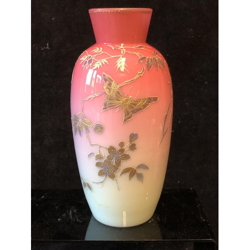 122 - A Bohemian peach blow overlay glass baluster vase, graduated deep pink over white, gilded with flowe... 