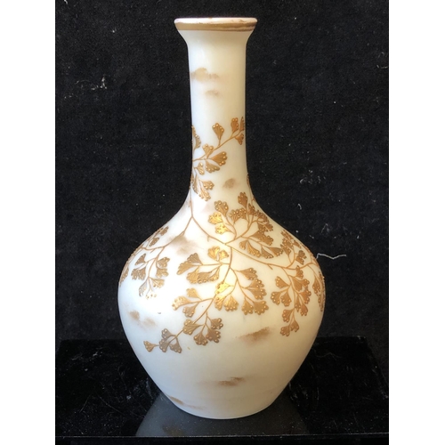 128 - A Harrach overlay glass bottle vase, cream over white, gilded with sprays of Maidenhair fern, 19.5cm... 