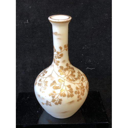 128 - A Harrach overlay glass bottle vase, cream over white, gilded with sprays of Maidenhair fern, 19.5cm... 