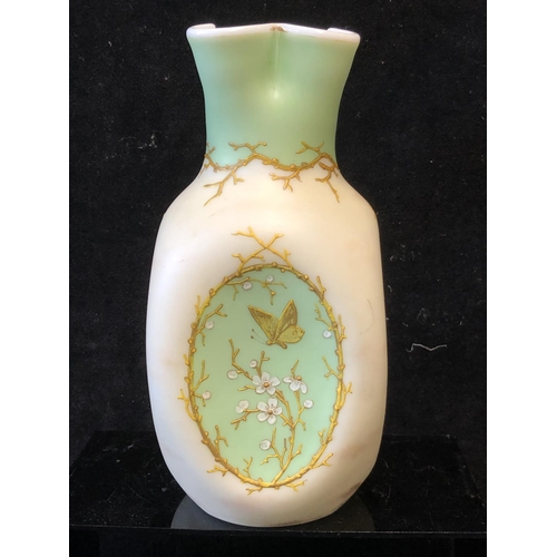 129 - A Harrach overlay glass vase, cream and green over white, of dimpled ovoid body with quatrefoil flut... 