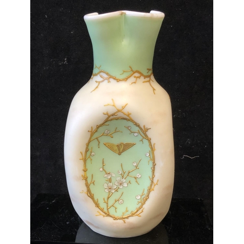 129 - A Harrach overlay glass vase, cream and green over white, of dimpled ovoid body with quatrefoil flut... 