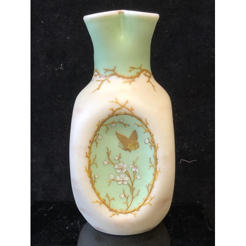 129 - A Harrach overlay glass vase, cream and green over white, of dimpled ovoid body with quatrefoil flut... 