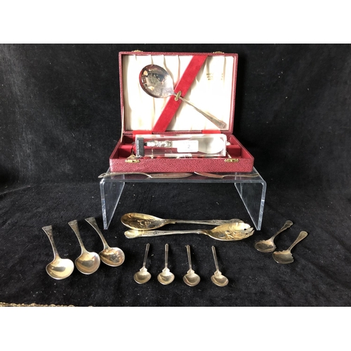 2 - Four silver golf trophy spoons, the handles formed as a pair of golf clubs with single ball finial, ... 