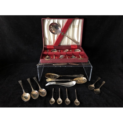 2 - Four silver golf trophy spoons, the handles formed as a pair of golf clubs with single ball finial, ... 