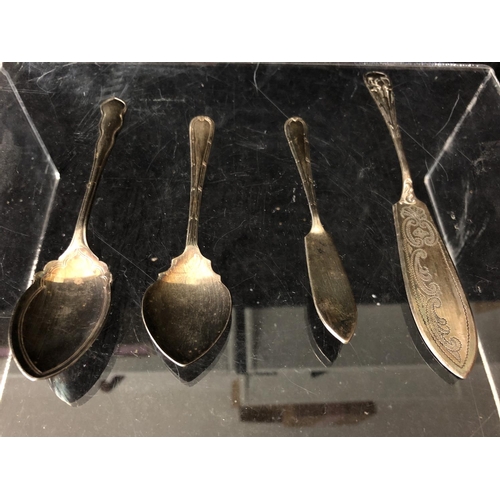 2 - Four silver golf trophy spoons, the handles formed as a pair of golf clubs with single ball finial, ... 