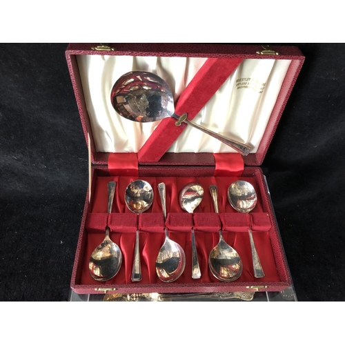 2 - Four silver golf trophy spoons, the handles formed as a pair of golf clubs with single ball finial, ... 