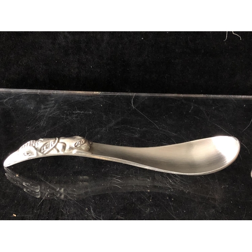 2 - Four silver golf trophy spoons, the handles formed as a pair of golf clubs with single ball finial, ... 