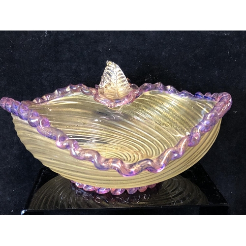 64 - A Murano heart form glass bowl, the body of gilt fleck swirled fluting, the rim trailed in amethyst/... 