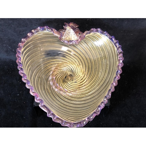 64 - A Murano heart form glass bowl, the body of gilt fleck swirled fluting, the rim trailed in amethyst/... 