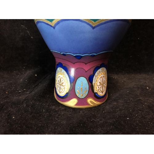 66 - A Soviet State Porcelain Factory vase, of ovoid body on cylindrical foot with trumpet neck, the grou... 