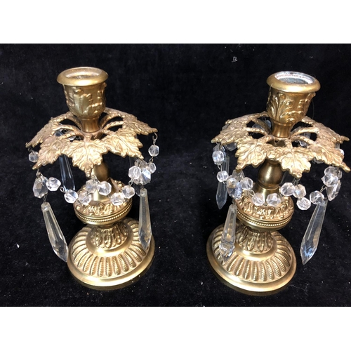 68 - A Pair of brass candlestick lustres, glass drops, 20cm high (2)