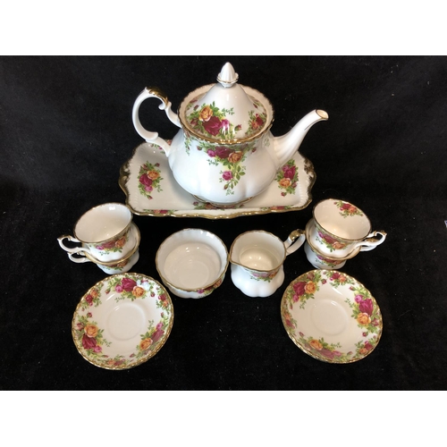 88 - A Royal Albert Old Country Roses pattern part teaservice, comprises sandwich plate, teapot and cover... 