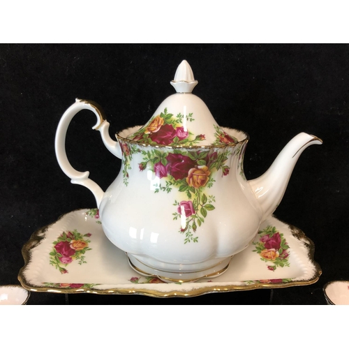 88 - A Royal Albert Old Country Roses pattern part teaservice, comprises sandwich plate, teapot and cover... 