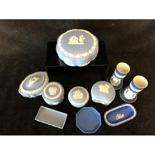 89 - A group of Wedgwood Jasper boxes and covers; a pair of Adams Blue dip jasper spill vases, each sprig... 