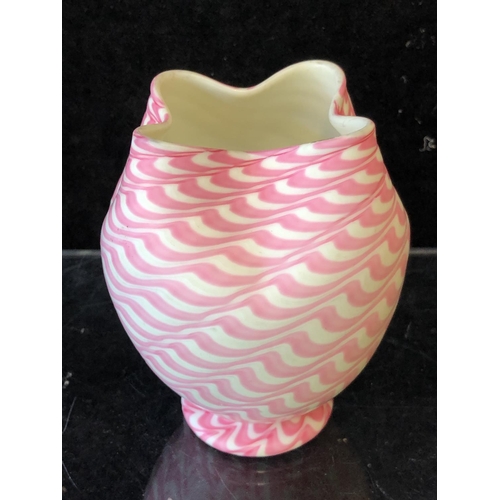 247 - An Osiris style glass vase, of bubble gum pink and cream colors, the quatrefoil crimped rim on ovoid... 