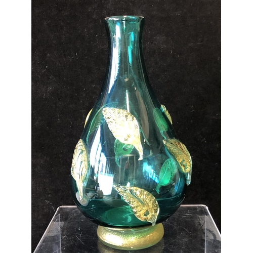 250 - A Barovier glass bottle vase, of sea green body applied with gold flecked leaf motifs on a circular ... 