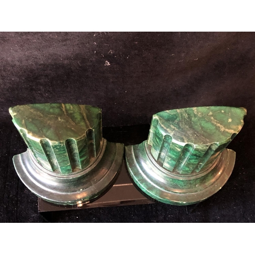 253 - A pair of green stained marble bookends, in the form of truncated columns, 14.5cm (2)