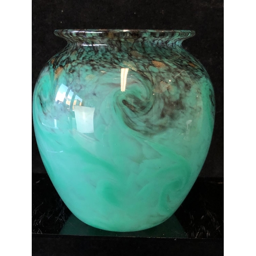 256 - A Monart glass vase, of ovoid form with everted rim, the jade green ground coloured with black and g... 