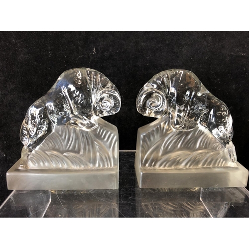 244 - A pair of Art Deco glass book ends modelled as charging rams, by the Libochovice glass company and a... 