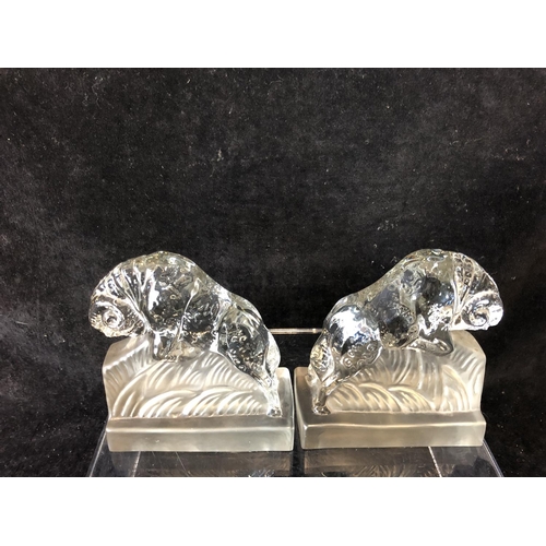 244 - A pair of Art Deco glass book ends modelled as charging rams, by the Libochovice glass company and a... 