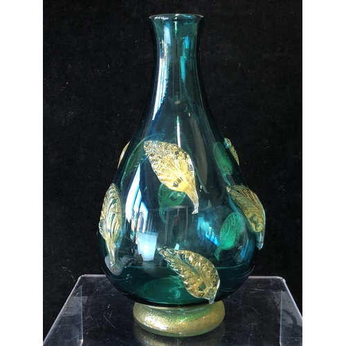 250 - A Barovier glass bottle vase, of sea green body applied with gold flecked leaf motifs on a circular ... 