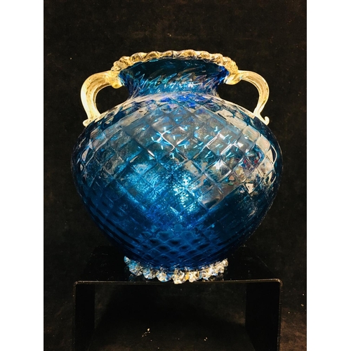 42 - Barovier - A bright blue ovoid two handled glass vase, the body mould blown with honeycomb design be... 