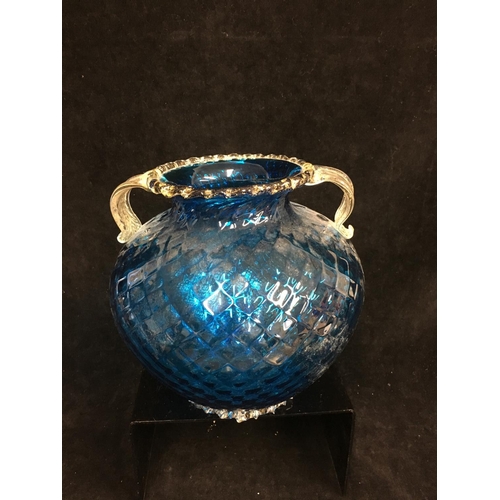 42 - Barovier - A bright blue ovoid two handled glass vase, the body mould blown with honeycomb design be... 