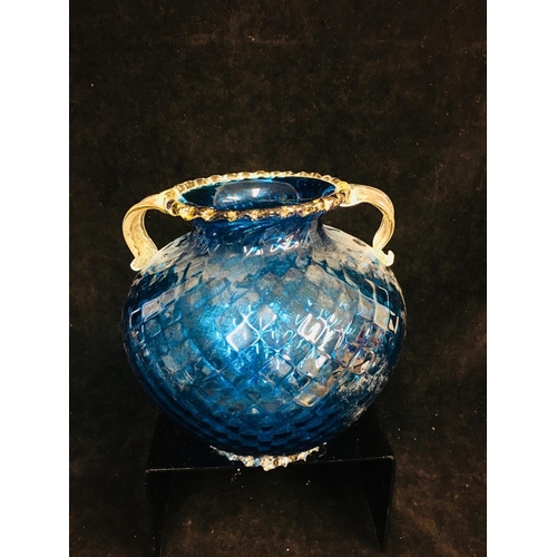 42 - Barovier - A bright blue ovoid two handled glass vase, the body mould blown with honeycomb design be... 