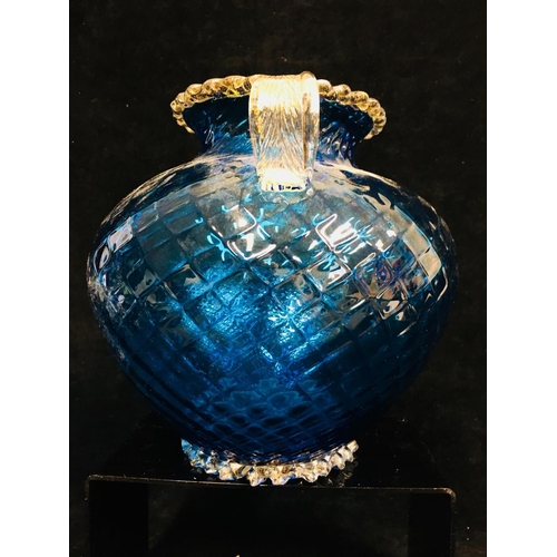 42 - Barovier - A bright blue ovoid two handled glass vase, the body mould blown with honeycomb design be... 