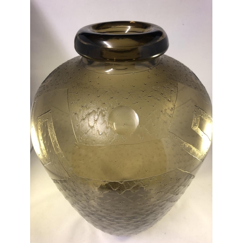 84 - Daum - a large Art Deco smoke amber glass urn vase, with polished ring upper lip, the body with acid... 