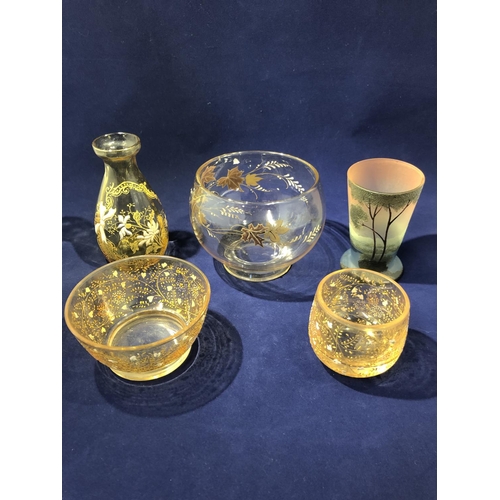 56 - Continental glass - five items of glass, comprising four of variously toned amber glass enameled in ... 