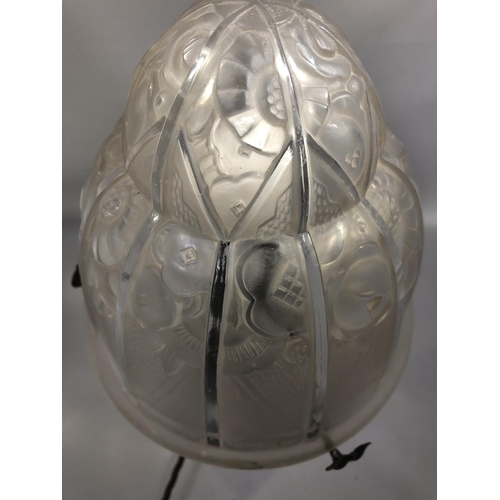 38 - Lighting - a table lamp - the Art Deco jelly mould form glass lampshade, decorated with stylised flo... 