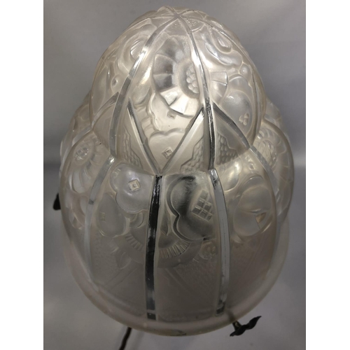 38 - Lighting - a table lamp - the Art Deco jelly mould form glass lampshade, decorated with stylised flo... 