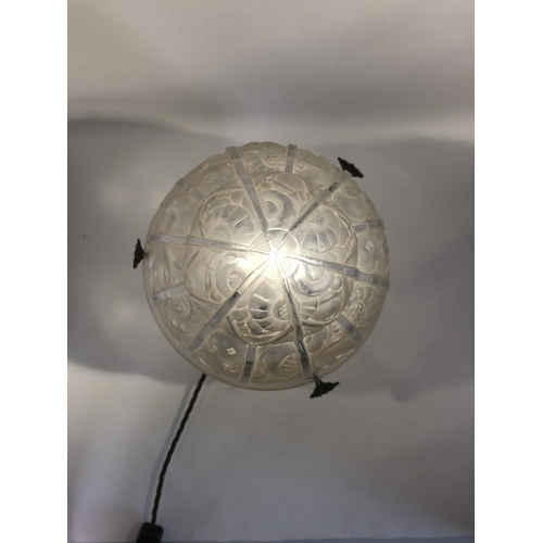 38 - Lighting - a table lamp - the Art Deco jelly mould form glass lampshade, decorated with stylised flo... 