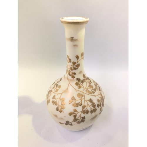 95 - Harrach - an overlay glass bottle vase, cream over white, gilded with sprays of Maidenhair fern and ... 