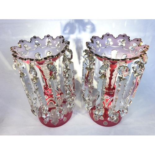 102 - Bohemian Glass - a pair of double overlay glass table lustres, of deep rose pink over white on colou... 