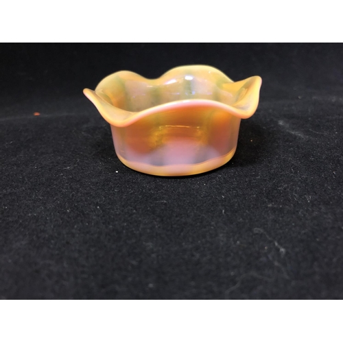 119 - Cristallerie de Pantin - an iridescent opaline glass salt, pink/orange colouration, circular with wa... 