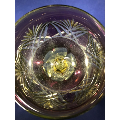 63 - Continental Glass - Two two colour overlay hock glasses, the bowls of green; and amethyst over yello... 