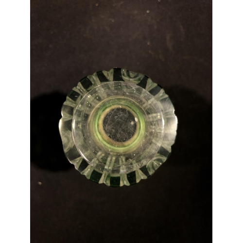 64 - Continental glass - a green overlay glass sugar caster, cylindrical with spreading foot, cut through... 