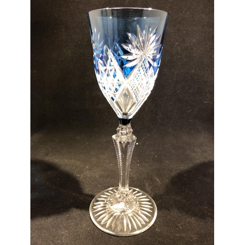 61 - Saint Louis - a pair of blue overlay wine glasses, the bowls cut through to colourless with diamond ... 