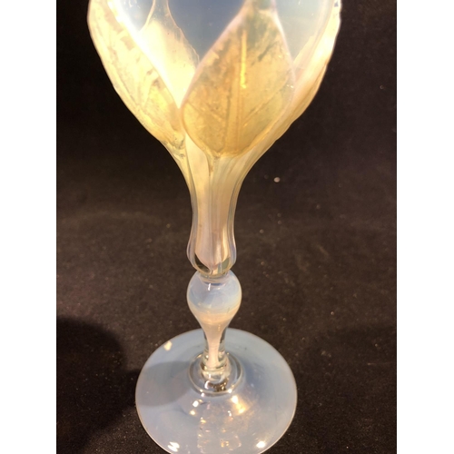 53 - Salviati - an elegant opaline wine glass, the tulip form bowl applied with five veined leaves over a... 