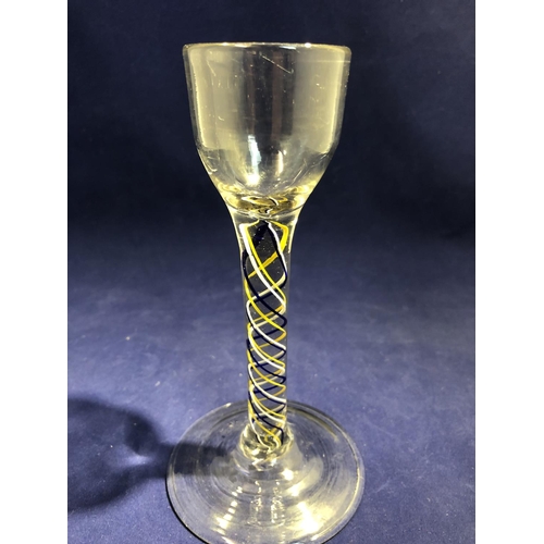 251 - English Glass - a three colour-twist cordial glass of canary yellow, blue and white twist threads, 1... 