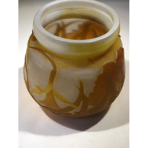 73 - Galle - a cameo glass vase, the orange cameo cut though to mottles white and yellow with a Dutch Lan... 