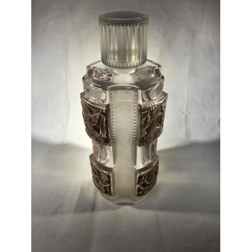 28 - Lalique - a Helene glass perfume bottle and cover, of colourless and frosted panels on columns with ... 