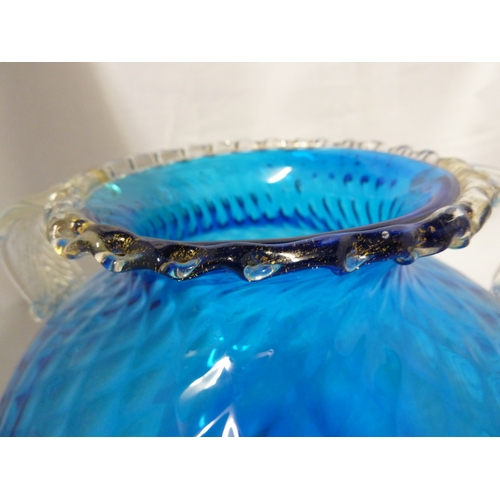 42 - Barovier - A bright blue ovoid two handled glass vase, the body mould blown with honeycomb design be... 