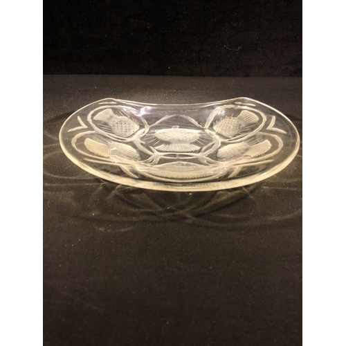 27 - Lalique - Chardon, a frosted and colourless glass crescent shape dish, decorated thistle designs, ha... 