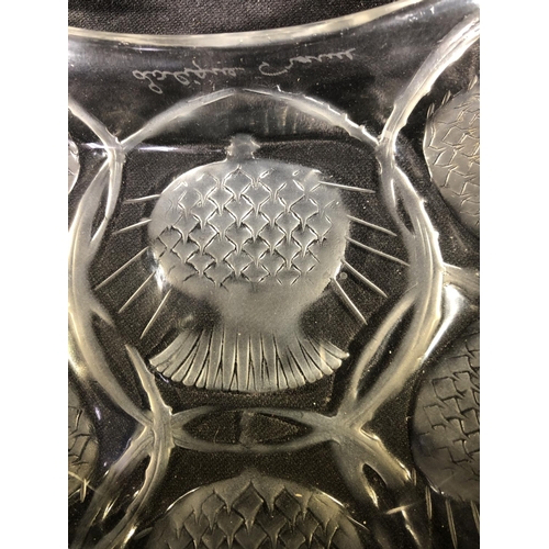 27 - Lalique - Chardon, a frosted and colourless glass crescent shape dish, decorated thistle designs, ha... 