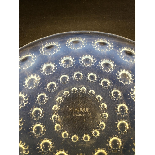 32 - Lalique - Asters, a small opalescent glass plate, decorated with flower heads in concentric rings, m... 