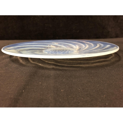 34 - Lalique - Poisson, an opalescent glass plate, decorated with curved fish radiating from a central bo... 